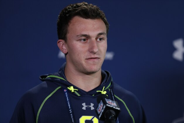 Feb 21, 2014; Indianapolis, IN, USA; Texas A&M Aggies quarterback Johnny Manziel speaks to the media in a press conference during the 2014 NFL Combine at Lucas Oil Stadium. Mandatory Credit: Brian Spurlock-USA TODAY Sports Feb 21, 2014; Indianapolis, IN, USA; Texas A&M Aggies quarterback Johnny Manziel speaks to the media in a press conference during the 2014 NFL Combine at Lucas Oil Stadium. Mandatory Credit: Brian Spurlock-USA TODAY Sports