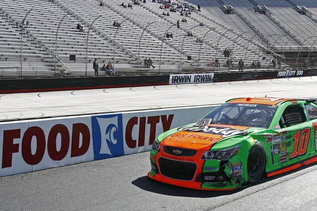 Driver Danica Patrick (10) rolls down pit road after hitting the wall during practice for the NASCAR Sprint Cup series auto race at Bristol Motor Speedway on Friday, March 14, 2014, in Bristol, Tenn. (AP Photo/Wade Payne)
