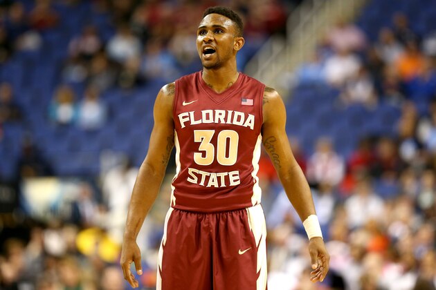 GREENSBORO, NC - MARCH 14:  Ian Miller #30 of the Florida State Seminoles reacts against the Virginia Cavaliers during the quarterfinals of the 2014 Men's ACC Basketball Tournament at Greensboro Coliseum on March 14, 2014 in Greensboro, North Carolina.  (Photo by Streeter Lecka/Getty Images)