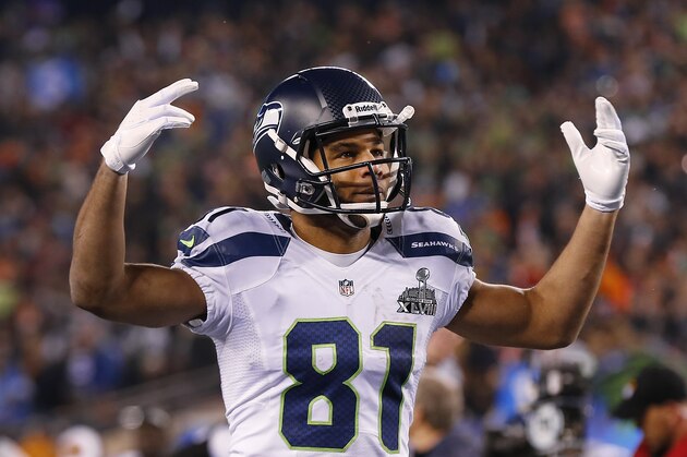 FILE - In this Feb. 2, 2014, file photo, Seattle Seahawks wide receiver Golden Tate celebrates against the Denver Broncos during the NFL Super Bowl XLVIII football game at MetLife Stadium in East Rutherford, N.J. The Detroit Lions have acquired Tate, their top target in free agency. (AP Photo/Paul Sancya, File)