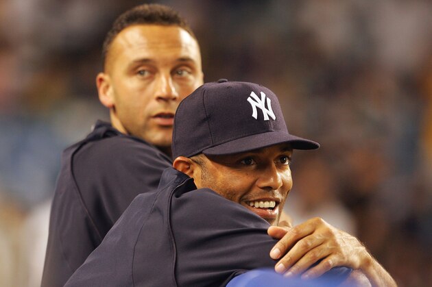 NEW YORK - JULY 15:  (L-R) American League All-Star Derek Jeter #2 and pitcher Mariano Rivera #42 of the New York Yankees look on from the dugout during the 79th MLB All-Star Game against the National League All-Stars at Yankee Stadium on July 15, 2008 in the Bronx borough of New York City.  (Photo by Jim McIsaac/Getty Images)