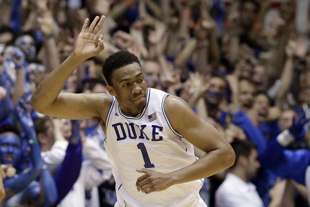 Duke's Jabari Parker reacts following a basket against North Carolina during the first half of an NCAA college basketball game in Durham, N.C., Saturday, March 8, 2014. (AP Photo/Gerry Broome)