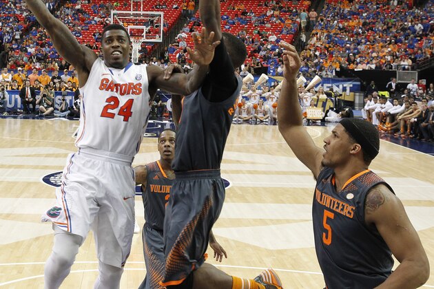 Florida forward Casey Prather (24) shoots against Tennessee forward Jarnell Stokes (5) during the second half of an NCAA college basketball game in the semifinal round of the Southeastern Conference men's tournament, Saturday, March 15, 2014, in Atlanta. Florida won 56-49. (AP Photo/John Bazemore) Florida forward Casey Prather (24) shoots against Tennessee forward Jarnell Stokes (5) during the second half of an NCAA college basketball game in the semifinal round of the Southeastern Conference men's tournament, Saturday, March 15, 2014, in Atlanta. Florida won 56-49. (AP Photo/John Bazemore)