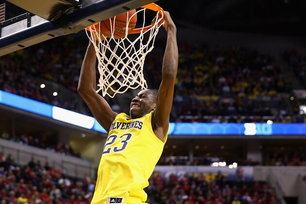 INDIANAPOLIS, IN - MARCH 15: Caris LeVert #23 of the Michigan Wolverines dunks the ball during the first half of the Big Ten Basketball Tournament Semifinal game against the Ohio State Buckeyes at Bankers Life Fieldhouse on March 15, 2014 in Indianapolis, Indiana. (Photo by Andy Lyons/Getty Images) INDIANAPOLIS, IN - MARCH 15: Caris LeVert #23 of the Michigan Wolverines dunks the ball during the first half of the Big Ten Basketball Tournament Semifinal game against the Ohio State Buckeyes at Bankers Life Fieldhouse on March 15, 2014 in Indianapolis, Indiana. (Photo by Andy Lyons/Getty Images)