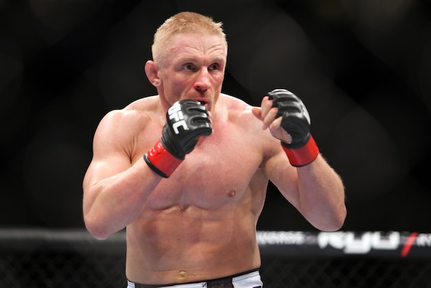 Dennis Siver in action against Nam Phan during a mixed martial arts bout at a UFC on FOX event in Seattle, Saturday, Dec. 8, 2012. Siver won via 3-round unanimous decision. (AP Photo/Gregory Payan)