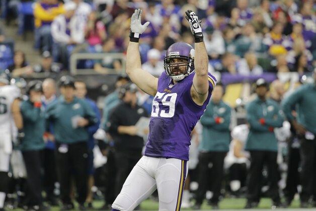 Minnesota Vikings defensive end Jared Allen (69) encourages the crowd during the first half of an NFL football game against the Philadelphia Eagles, Sunday, Dec. 15, 2013, in Minneapolis. (AP Photo/Ann Heisenfelt)