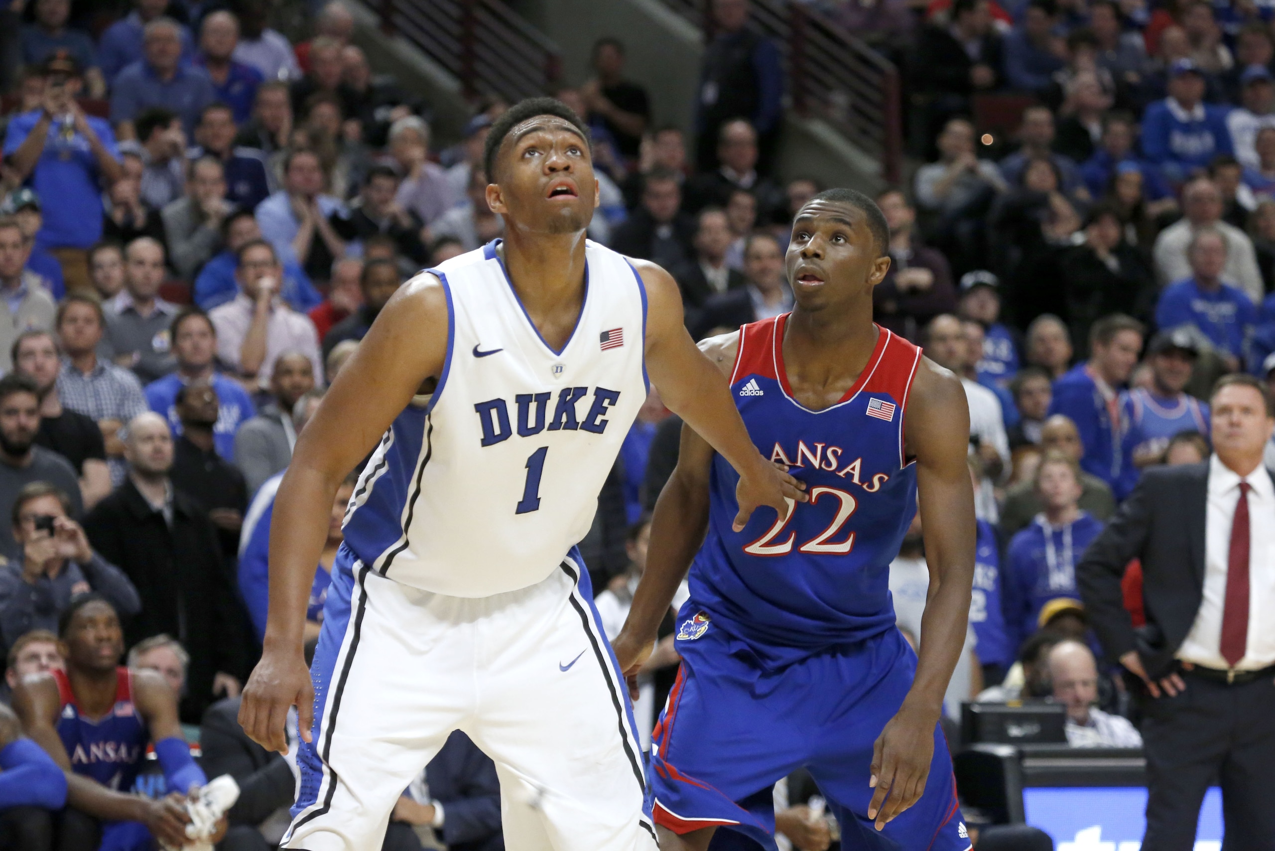 Duke forward Jabari Parker and Kansas guard Andrew Wiggins look for a possible rebound off a free-throw attempt during the second half of an NCAA college basketball game Tuesday, Nov. 12, 2013, in Chicago. Kansas won 94-83. (AP Photo/Charles Rex Arbogast) Duke forward Jabari Parker and Kansas guard Andrew Wiggins look for a possible rebound off a free-throw attempt during the second half of an NCAA college basketball game Tuesday, Nov. 12, 2013, in Chicago. Kansas won 94-83. (AP Photo/Charles Rex Arbogast)