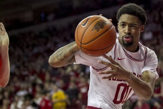 Arkansas' Rashad Madden passes the ball during the first half an NCAA college basketball game against Auburn in Fayetteville, Ark., Wednesday, Jan. 16, 2013. (AP Photo/Gareth Patterson) Arkansas' Rashad Madden passes the ball during the first half an NCAA college basketball game against Auburn in Fayetteville, Ark., Wednesday, Jan. 16, 2013. (AP Photo/Gareth Patterson)