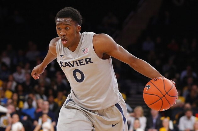 Mar 13, 2014; New York, NY, USA; Xavier Musketeers guard Semaj Christon (0) drives to the basket against the Marquette Golden Eagles in the second round of the Big East college basketball tournament at Madison Square Garden. Xavier Musketeers defeat the Marquette Golden Eagles 68-65. Mandatory Credit: Jim O'Connor-USA TODAY Sports