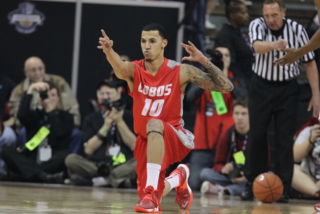 New Mexico's Kendall Williams reacts to a foul during the first half of an NCAA college basketball game against San Diego State for the Mountain West Conference tournament championship on Saturday, March 15, 2014, in Las Vegas. (AP Photo/Isaac Brekken)