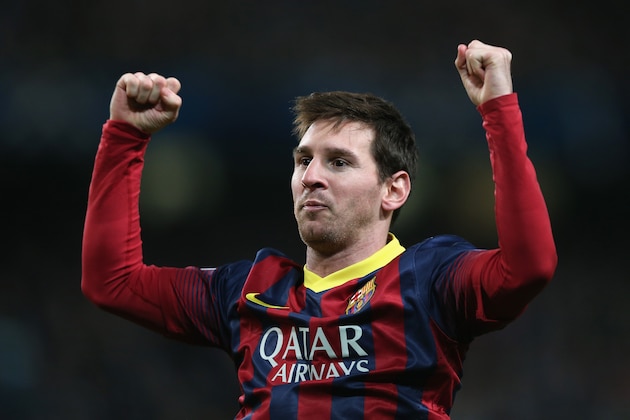 MANCHESTER, ENGLAND - FEBRUARY 18:  Lionel Messi of Barcelona celebrates scoring the opening goal from a penalty kick during the UEFA Champions League Round of 16 first leg match between Manchester City and Barcelona at the Etihad Stadium on February 18, 2014 in Manchester, England.  (Photo by Clive Brunskill/Getty Images)