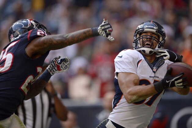 Dec 22, 2013; Houston, TX, USA; Denver Broncos wide receiver Eric Decker (87) catches a pass for a touchdown against the Houston Texans during the second half at Reliant Stadium. The Broncos won 37-13. Mandatory Credit: Thomas Campbell-USA TODAY Sports Dec 22, 2013; Houston, TX, USA; Denver Broncos wide receiver Eric Decker (87) catches a pass for a touchdown against the Houston Texans during the second half at Reliant Stadium. The Broncos won 37-13. Mandatory Credit: Thomas Campbell-USA TODAY Sports