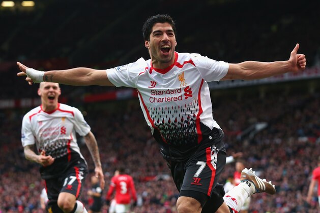 MANCHESTER, ENGLAND - MARCH 16:  Luis Suarez of Liverpool celebrates scoring his team's third goal during the Barclays Premier League match between Manchester United and Liverpool at Old Trafford on March 16, 2014 in Manchester, England.  (Photo by Alex Livesey/Getty Images)