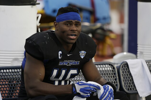 Buffalo linebacker Khalil Mack (46) sits on the team bench during the second half of an NCAA college football game against Connecticut on Saturday, Sept. 28, 2013, in Buffalo, N.Y. Buffalo won, 41-12. (AP Photo/Mike Groll)