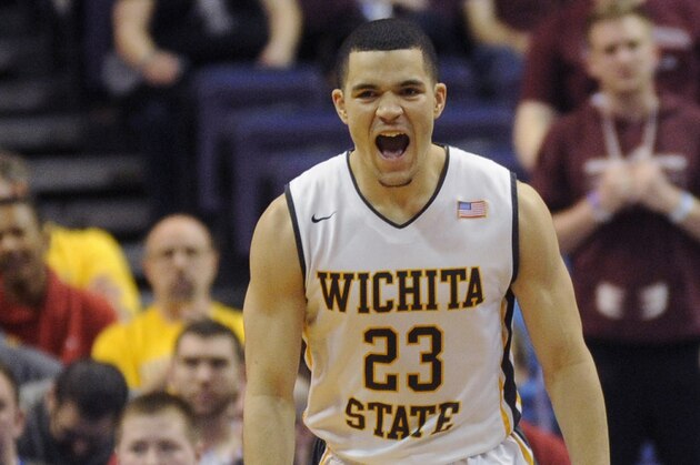 Wichita State's Fred VanVleet (23) celebrates a basket against Missouri State in the first half of an NCAA college basketball game in the semifinals of the Missouri Valley Conference men's tournament, Saturday, March 8, 2014, in St. Louis. (AP Photo/Bill Boyce)