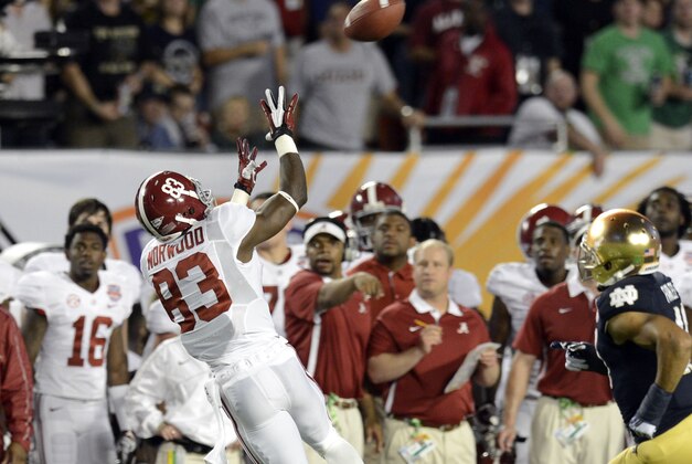 Jan 7, 2013; Miami, FL, USA; Alabama Crimson Tide wide receiver Kevin Norwood (83) catches a pass during the first half of the 2013 BCS Championship game against the Notre Dame Fighting Irish at Sun Life Stadium.  Mandatory Credit: John David Mercer-USA TODAY Sports
