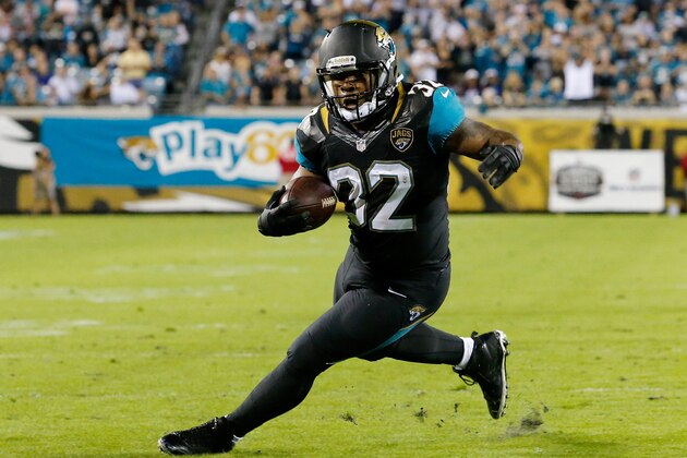 JACKSONVILLE, FL - DECEMBER 05:   Maurice Jones-Drew #32 of the Jacksonville Jaguars rushes for yardage during the game against the Houston Texans at EverBank Field on December 5, 2013 in Jacksonville, Florida.  (Photo by Sam Greenwood/Getty Images)