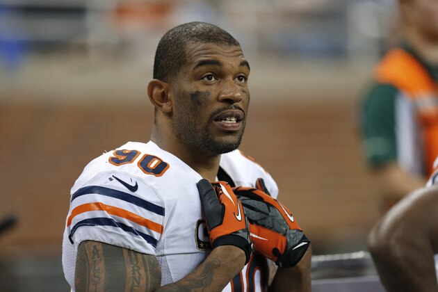 Chicago Bears defensive end Julius Peppers (90) watches from the bench during the fourth quarter of an NFL football game against the Detroit Lions at Ford Field in Detroit, Sunday, Sept. 29, 2013. (AP Photo/Paul Sancya)