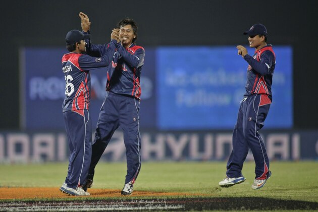 Nepal bowler Shakti Gauchan, center, celebrates the dismissal of Hong Kong's Aizaz Khan during their ICC Twenty20 Cricket World Cup match in Chittagong, Bangladesh, Sunday, March 16, 2014. (AP Photo/Bikas Das) Nepal bowler Shakti Gauchan, center, celebrates the dismissal of Hong Kong's Aizaz Khan during their ICC Twenty20 Cricket World Cup match in Chittagong, Bangladesh, Sunday, March 16, 2014. (AP Photo/Bikas Das)