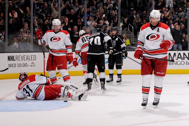 LOS ANGELES, CA - MARCH 1:  Mike Richards #10 of the Los Angeles Kings celebrate after scoring a goal against the Carolina Hurricanes at Staples Center on March 1, 2014 in Los Angeles, California. (Photo by Juan Ocampo/NHLI via Getty Images)