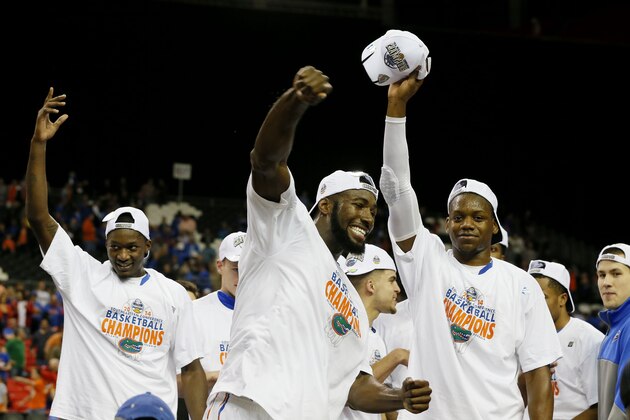 ATLANTA, GA - MARCH 16: Patric Young #4 of the Florida Gators and teammates celebrate their 61 to 60 win over the Kentucky Wildcats in the Championship game of the 2014 Men's SEC Basketball Tournament at Georgia Dome on March 16, 2014 in Atlanta, Georgia. (Photo by Kevin C. Cox/Getty Images) ATLANTA, GA - MARCH 16: Patric Young #4 of the Florida Gators and teammates celebrate their 61 to 60 win over the Kentucky Wildcats in the Championship game of the 2014 Men's SEC Basketball Tournament at Georgia Dome on March 16, 2014 in Atlanta, Georgia. (Photo by Kevin C. Cox/Getty Images)