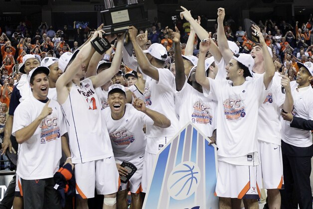 Virginia players celebrate with the trophy after defeating Duke in an NCAA college basketball game in the championship of the Atlantic Coast Conference tournament in Greensboro, N.C., Sunday, March 16, 2014. Virginia won 72-63. (AP Photo/Gerry Broome) Virginia players celebrate with the trophy after defeating Duke in an NCAA college basketball game in the championship of the Atlantic Coast Conference tournament in Greensboro, N.C., Sunday, March 16, 2014. Virginia won 72-63. (AP Photo/Gerry Broome)