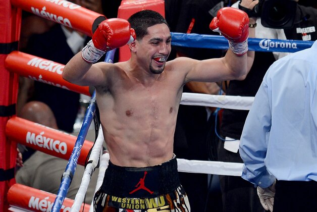 LAS VEGAS, NV - SEPTEMBER 14:  Danny Garcia celebrates after the 12th round against Lucas Matthysse in their WBC/WBA super lightweight title fight at the MGM Grand Garden Arena on September 14, 2013 in Las Vegas, Nevada.  (Photo by Ethan Miller/Getty Images)