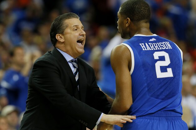 ATLANTA, GA - MARCH 16:  Head coach John Calipari of the Kentucky Wildcats talks to Aaron Harrison #2 in the first half against the Florida Gators during the Championship game of the 2014 Men's SEC Basketball Tournament at Georgia Dome on March 16, 2014 in Atlanta, Georgia.  (Photo by Kevin C. Cox/Getty Images)