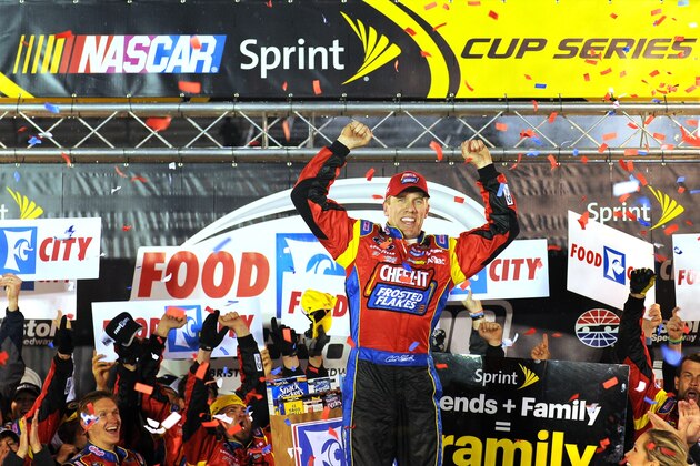 BRISTOL, TN - MARCH 16:  Carl Edwards, driver of the #99 Kellogg's / Frosted Flakes Ford, celebrates in Victory Lane after taking the checkered flag under caution in the NASCAR Sprint Cup Series Food City 500 at Bristol Motor Speedway on March 16, 2014 in Bristol, Tennessee.  (Photo by Will Schneekloth/Getty Images)