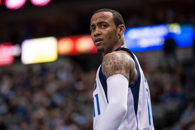 Mar 7, 2014; Dallas, TX, USA; Dallas Mavericks shooting guard Monta Ellis (11) reacts to a foul call during the first quarter against the Portland Trail Blazers at the American Airlines Center. Mandatory Credit: Jerome Miron-USA TODAY Sports
