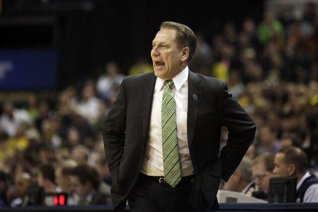 Michigan State head coach Tom Izzo directs his team in the first half of an NCAA college basketball game against Michigan in the championship of the Big Ten Conference tournament Sunday, March 16, 2014, in Indianapolis. (AP Photo/Kiichiro Sato)