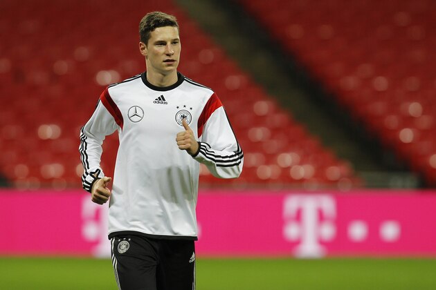 LONDON, ENGLAND - NOVEMBER 18: Julian Draxler of Germany warms up during a training session at Wembley Stadium ahead of their International Friendly against England on November 18, 2013 in London, England. (Photo by Charlie Crowhurst/Getty Images)