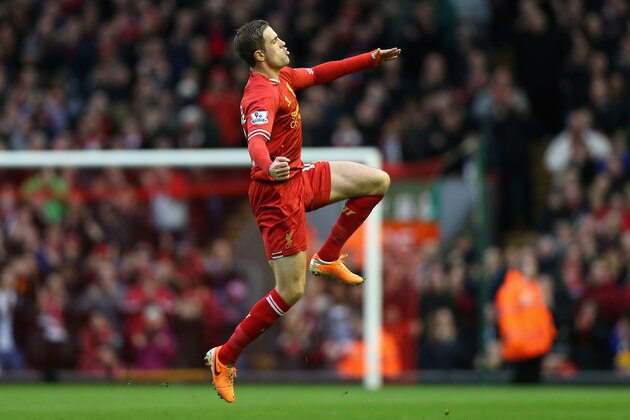LIVERPOOL, ENGLAND - FEBRUARY 23:  Jordan Henderson of Liverpool celebrates scoring the second goal during the Barclays Premier League match between Liverpool and Swansea City at Anfield on February 23, 2014 in Liverpool, England.  (Photo by Clive Brunskill/Getty Images)