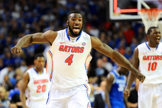 Mar 16, 2014; Atlanta, GA, USA; Florida Gators center Patric Young (4) reacts as time expires and his team defeats the Kentucky Wildcats in the championship game for the SEC college basketball tournament at Georgia Dome. Florida defeated Kentucky 61-60. Mandatory Credit: Dale Zanine-USA TODAY Sports