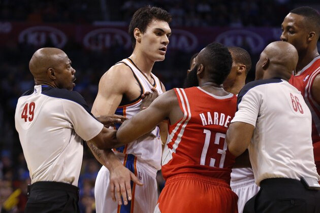 Officials Tom Washington (49) and Haywoode Workman (66) move in to separate Oklahoma City Thunder center Steven Adams (12) and Houston Rockets guard James Harden (13) during the third quarter of an NBA basketball game in Oklahoma City, Tuesday, March 11, 2014. Oklahoma City won 106-98. (AP Photo/Sue Ogrocki) Officials Tom Washington (49) and Haywoode Workman (66) move in to separate Oklahoma City Thunder center Steven Adams (12) and Houston Rockets guard James Harden (13) during the third quarter of an NBA basketball game in Oklahoma City, Tuesday, March 11, 2014. Oklahoma City won 106-98. (AP Photo/Sue Ogrocki)