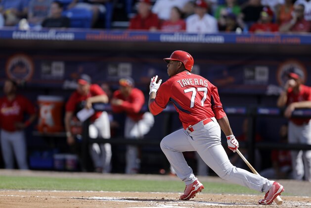 St. Louis Cardinals' Oscar Taveras doubles during the second inning of an exhibition spring training baseball game against the New York Mets Friday, March 7, 2014, in Port St. Lucie, Fla. (AP Photo/Jeff Roberson)