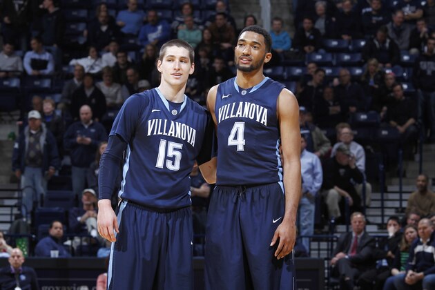 CINCINNATI, OH - MARCH 6: Darrun Hilliard #4 and Ryan Arcidiacono #15 of the Villanova Wildcats celebrate in the closing seconds of the game against the Xavier Musketeers at Cintas Center on March 6, 2014 in Cincinnati, Ohio. Villanova defeated Xavier 77-70. (Photo by Joe Robbins/Getty Images)