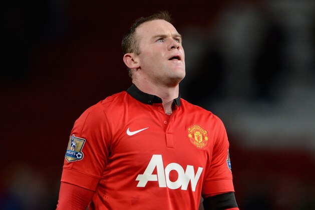 MANCHESTER, ENGLAND - FEBRUARY 09:  Wayne Rooney of Manchester United looks dejected at the end of the Barclays Premier League match between Manchester United and Fulham at Old Trafford on February 9, 2014 in Manchester, England.  (Photo by Michael Regan/Getty Images)