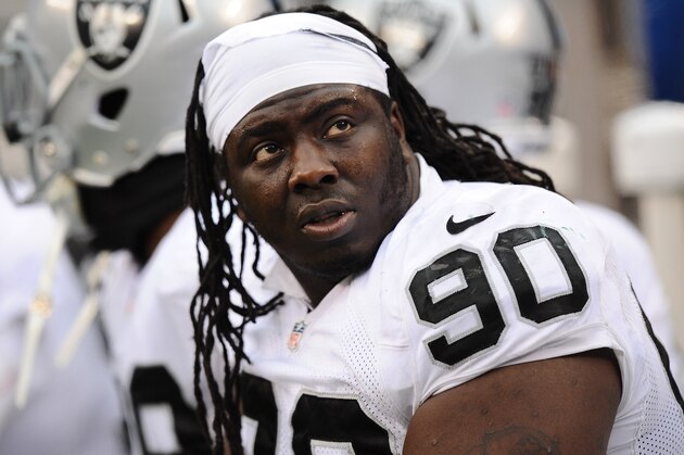 EAST RUTHERFORD, NJ - DECEMBER 08:  Pat Sims #90 of the Oakland Raiders looks on during the first half against the New York Jets at MetLife Stadium on December 8, 2013 in East Rutherford, New Jersey.  (Photo by Maddie Meyer/Getty Images)