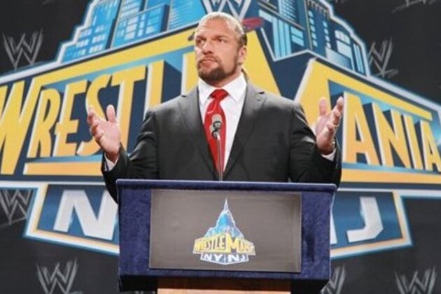 World Wrestling Entertainment personality Triple H speaks at a news conference in East Rutherford, N.J., Thursday, Feb. 16, 2012, to announce that MetLife Stadium will host WrestleMania XXIX on April 7, 2013. (AP Photo/StarPix, Dave Allocca)