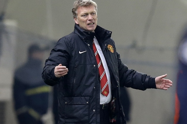 Manchester United's coach David Moyes reacts after to a players' mistake during a Champions League, round of 16, first leg soccer match against Olympiakos at Georgios Karaiskakis stadium, in Piraeus port, near Athens, on Tuesday, Feb. 25, 2014. Olympiakos won 2-0. (AP Photo/Thanassis Stavrakis) Manchester United's coach David Moyes reacts after to a players' mistake during a Champions League, round of 16, first leg soccer match against Olympiakos at Georgios Karaiskakis stadium, in Piraeus port, near Athens, on Tuesday, Feb. 25, 2014. Olympiakos won 2-0. (AP Photo/Thanassis Stavrakis)