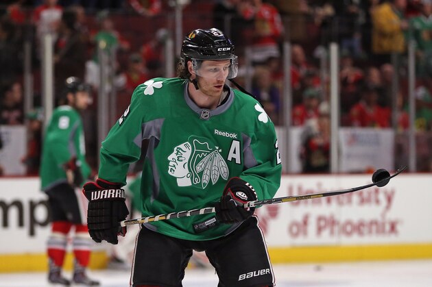 CHICAGO, IL - MARCH 16: Duncan Keith #2 of the Chicago Blackhawks participates in warm-ups wearing a green jersey for St. Patrick's Day before a game against the Detroit Red Wings at the United Center on March 16, 2014  in Chicago, Illinois.  (Photo by Jonathan Daniel/Getty Images)