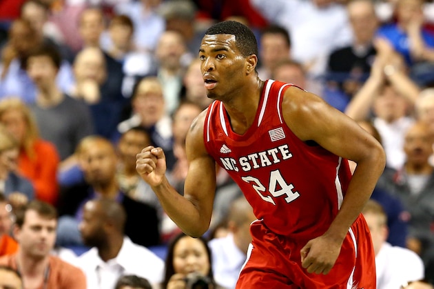 GREENSBORO, NC - MARCH 14:  T.J. Warren #24 of the North Carolina State Wolfpack reacts as he runs up the court against the Syracuse Orange during the quarterfinals of the 2014 Men's ACC Basketball Tournament at Greensboro Coliseum on March 14, 2014 in Greensboro, North Carolina.  (Photo by Streeter Lecka/Getty Images)