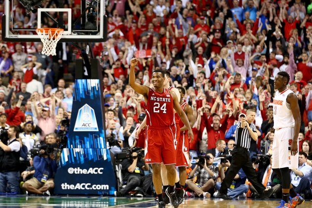 GREENSBORO, NC - MARCH 14:  T.J. Warren #24 of the North Carolina State Wolfpack celebrates after defeating the Syracuse Orange 66-63 during the quarterfinals of the 2014 Men's ACC Basketball Tournament at Greensboro Coliseum on March 14, 2014 in Greensboro, North Carolina.  (Photo by Streeter Lecka/Getty Images)