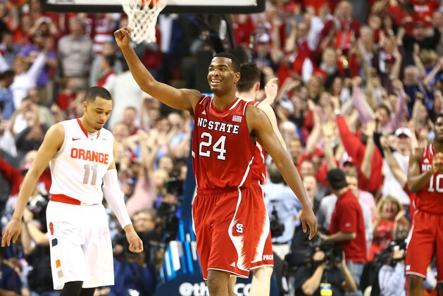GREENSBORO, NC - MARCH 14:  T.J. Warren #24 of the North Carolina State Wolfpack celebrates after defeating the Syracuse Orange 66-63 during the quarterfinals of the 2014 Men's ACC Basketball Tournament at Greensboro Coliseum on March 14, 2014 in Greensboro, North Carolina.  (Photo by Streeter Lecka/Getty Images)