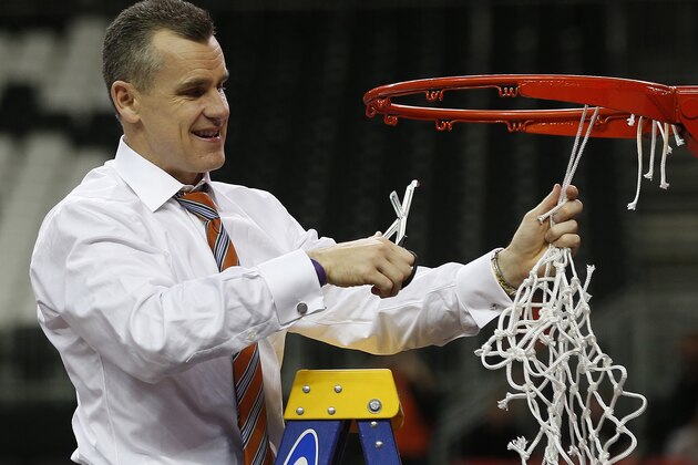 Florida head coach Billy Donovan takes the net after the second half of an NCAA college basketball game against Kentucky in the Championship round of the Southeastern Conference men's tournament, Sunday, March 16, 2014, in Atlanta. Florida won 61-60. (AP Photo/John Bazemore)