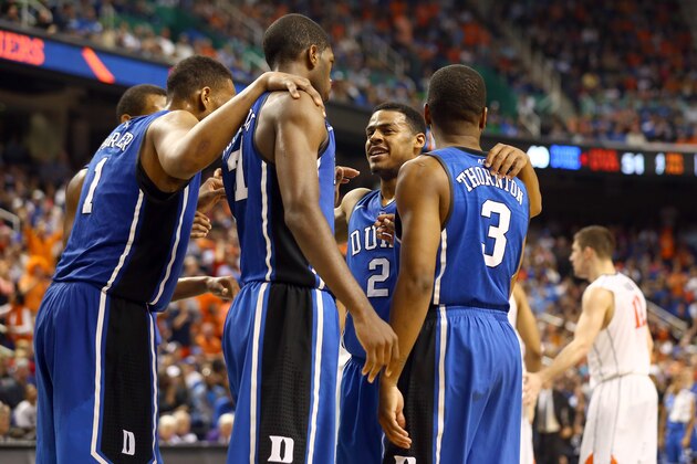 GREENSBORO, NC - MARCH 16:  The Duke Blue Devils huddle together during their game against the Virginia Cavaliers in the finals of the 2014 Men's ACC Basketball Tournament at Greensboro Coliseum on March 16, 2014 in Greensboro, North Carolina.  (Photo by Streeter Lecka/Getty Images)