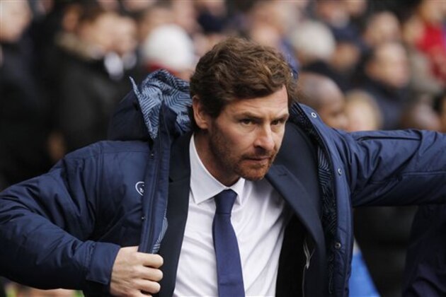FILE - This is a Sunday, Dec. 1, 2013 file photo of Tottenham Hotspur's manager Andre Villas-Boas as he looks on from the dugout before the start of their English Premier League soccer match against Manchester United at White Hart Lane, London  Tottenham manager Andre Villas-Boas has been fired by the Premier League club on Monday Dec. 16, 2013 a day after a 5-0 loss to Liverpool left the Portuguese coach under pressure. (AP Photo/Sang Tan, File)