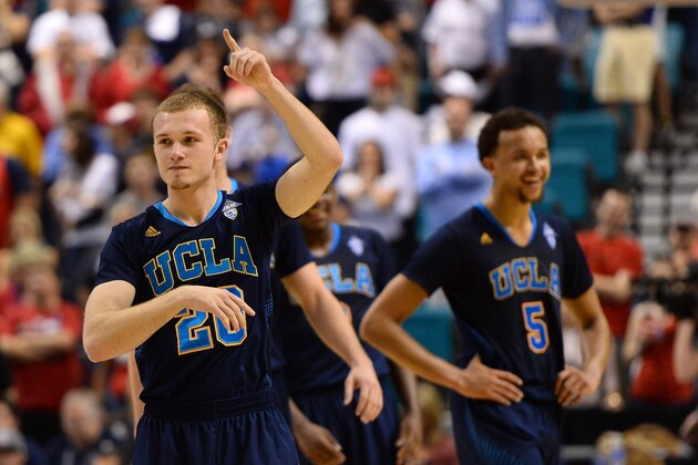 LAS VEGAS, NV - MARCH 15:  Bryce Alford #20 and Kyle Anderson #5 of the UCLA Bruins celebrate on the court late in the championship game of the Pac-12 Basketball Tournament against the Arizona Wildcats at the MGM Grand Garden Arena on March 15, 2014 in Las Vegas, Nevada. UCLA won 75-71.  (Photo by Ethan Miller/Getty Images)