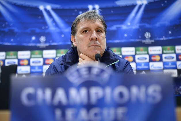 FC Barcelona's coach Gerardo Tata Martino, from Argentina, attends a news conference at the Sports Center FC Barcelona Joan Gamper in San Joan Despi, Spain, Tuesday, March 11, 2014. FC Barcelona will play against Manchester City in a last sixteen Champions League match on Wednesday March 12.  (AP Photo/Manu Fernandez)